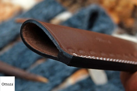Close-up of handcrafted Top Grain Leather Knife Sheath showing stitching detail for fixed blade knives, handcrafted cowhide everyday carry EDC gear.