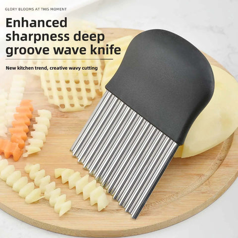 Front view of stainless steel crinkle cutter with black handle, used for slicing potatoes and carrots