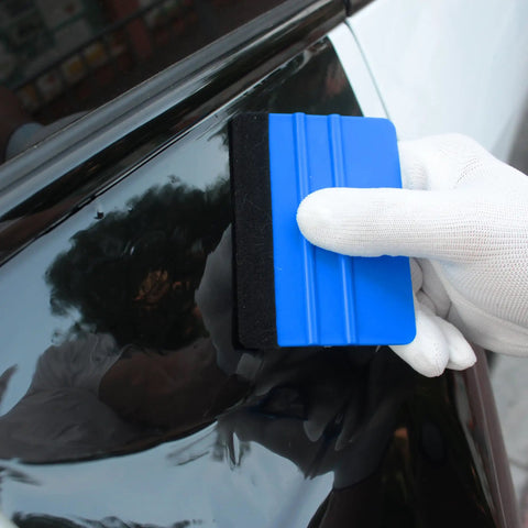 All In One Car Vinyl Wrap Tool Kit With 1800W Heat Gun Felt Squeegee in use on car surface