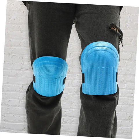 Heavy Duty Work Knee Pads For Men And Women With Tight Non Slip Grip Two Pairs In Sharp Blue And Black on black pants.