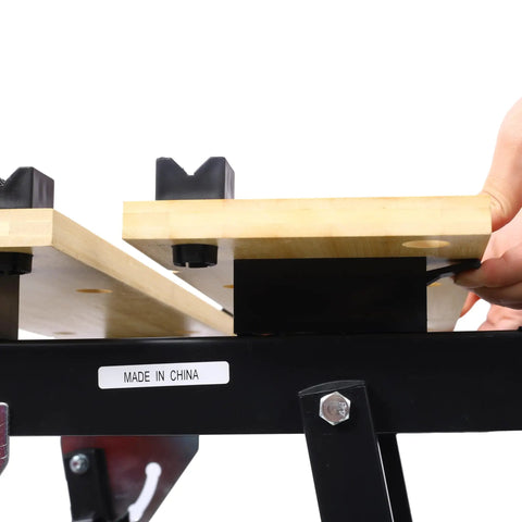 Close-up of Hella Tough Portable Workbench Featuring A Heavy Duty Vise Foldable Work Table Holding Up To 550 Pounds with wood top.