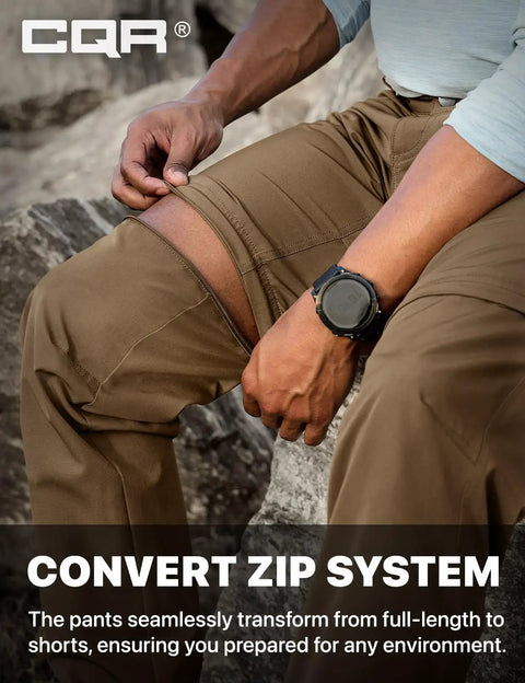Man demonstrating the zip-off feature on Mens Convertible Cargo Pants For Hiking And Work Water Resistant Zip Off Stretch Tactical Pants.