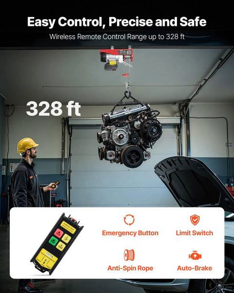 Electric hoist with wireless remote lifting car engine in a garage; red hoist, worker in yellow hard hat.