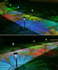 12 Pack Solar Pathway Lights With Cool Color Changing LED Landscape Lighting Waterproof Outdoor Garden Decor Auto On Off With 7 Color Options For Yard Walkway Driveway Patio And Lawn lighting up a pathway with colorful patterns at night