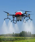 Workhorse Crop Sprayer Drone With 8 Gallon Payload spreading granules over farmland, 30 to 38 acres per hour efficiency.