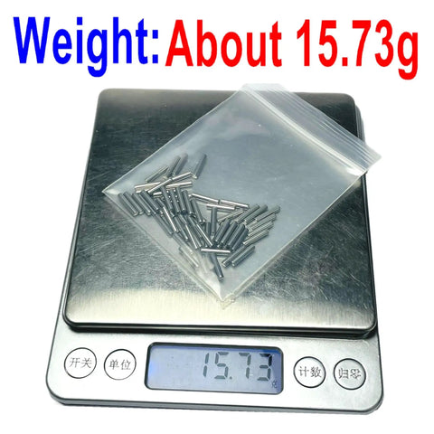 Built Tough Precision Ground 2mm X 10mm Dowel Pins 60 Pack stainless steel on scale weighing about 15.73g.