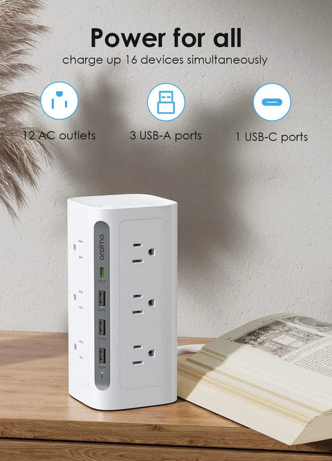 Must Have Boss Level Compact Power Tower Surge Protector with USB Ports on a wooden table next to an open book.