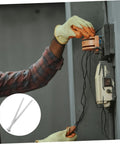 Person using Super Duper Spring Tubing Bender Kit Two Pack Essential Hand Tool for plumbing on wall mounted device.
