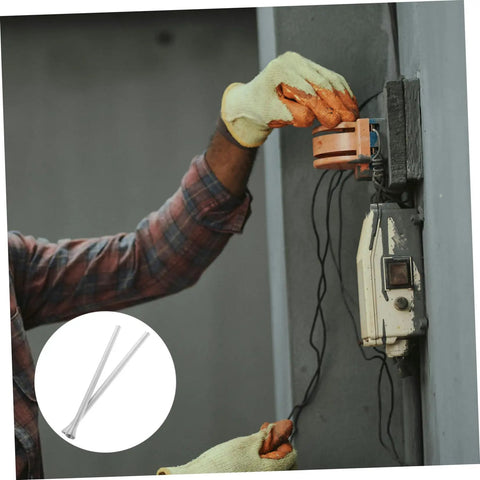 Person using Super Duper Spring Tubing Bender Kit Two Pack Essential Hand Tool for plumbing on wall mounted device.