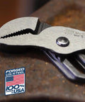Close-up of Tongue And Groove Pliers 9.5 Inch Straight Jaw With 1.5 Inch Jaw Capacity on metal surface, Made in USA