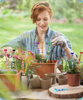 Diy Sparkle Fairy Wand Garden Stakes and Plant Support Kit with vibrant rhinestone markers in flower pots outdoors.