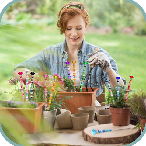 Diy Sparkle Fairy Wand Garden Stakes and Plant Support Kit with vibrant rhinestone markers in flower pots outdoors.