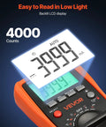 All In One Digital Multimeter With 4000 Count TRMS Readouts For DC And AC Voltage And Current, showing backlit LCD display