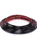 Top view of glossy black 1/2-in automotive trim molding coil, 25 ft, self-adhesive.