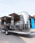 Fully Equipped Compact Concession Food Trailer Mobile Kitchen For Street Vending with stainless steel exterior and awning.