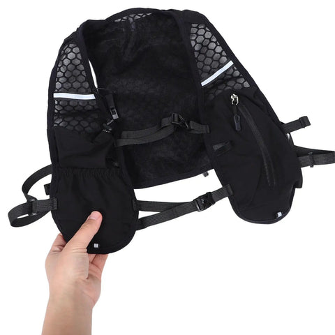 Back interior view of Go To Hydration Backpack For Running Cycling And Hiking With Quick Access Water Bladder Lightweight Reflective Gear