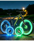 Rechargeable Bike Wheel Lights With 21 Dynamic Modes And Full Color Options Clip On Hub LEDs displayed on a bicycle at night