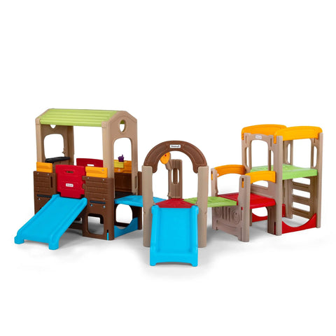Young Explorers Modular Outdoor Playset For Kids Ages 18 Months To 6 Years with slide and playhouse in backyard setting