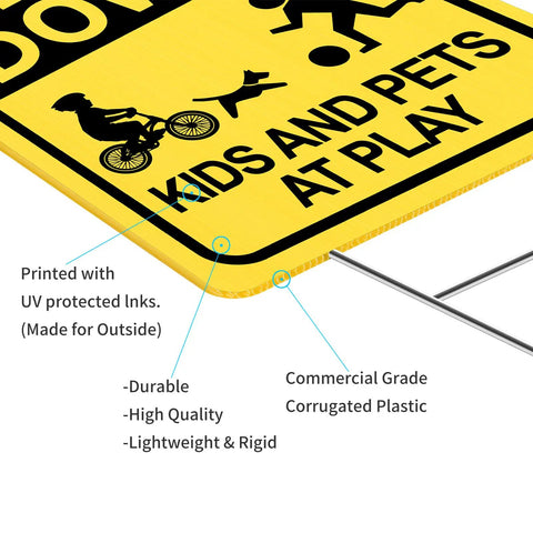 Close-up of Slow Down Kids And Pets At Play Sign 2 Pack With Metal Stakes, showing durable corrugated plastic material