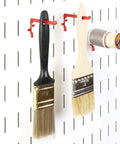 Narrow 3.5-Inch Reach Slotted Peg Hooks Set for Paint Brushes and Spools, Metal Pegboard Organizer, 4 Pack, Black, in use on wall mount