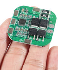 Pack Of Four Heavy Duty Bms For 18650 Lithium Ion Cells With Dead Simple Plug And Play Wiring And Built Tough Short Circuit Safety Protection And Smooth Automatic Balancing, showing a close-up of BMS board in hand.
