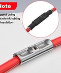 Front view of non-insulated silver butt connector crimped to red wire; inset shows black heat-shrink tubing on the wire.