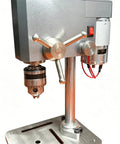 Ace Mini Bench Drill Press Delivering Sweet Variable Speed Control With Heavy Duty Chuck Grip For Zero Drama Woodworking Metal Drilling And Quick Jewelry Crafting Jobs close-up of drill chuck and control panel.