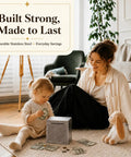 Mother and child with Stainless Steel Money Saving Box With Built In Counter Break To Open Piggy Bank For Adults And Kids.