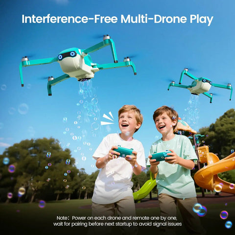 Two kids playing with Bubble Drone For Kids And Beginners With Headless Mode, Auto Rotation, Dual Batteries at a park, bubbles fill the air.