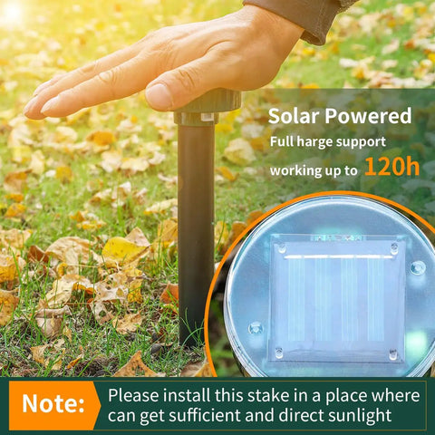 Hand installing Solar Powered Mole Repellent Stake For Lawns And Gardens Ultrasonic Gopher And Snake Deterrent