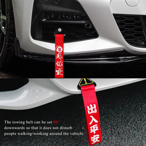 Badass JDM Tow Strap Rock Solid Recovery Rope Slick Red Auto Racing Traction Line with bold decals attached to front bumper.