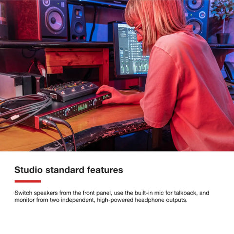 Person using Scarlett 18i20 4th Gen USB Audio Interface for multitrack recording and music production at a studio desk.