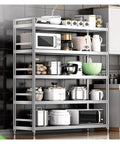 Heavy Duty 5 Tier Stainless Steel Shelving Unit Rock Solid Storage Rack With 330 Lb Load Capacity holds kitchen appliances and pots.