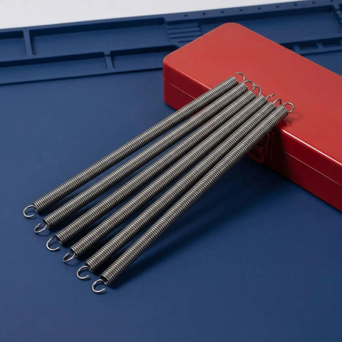 6 Piece Stainless Steel Extension Springs With Double Hook Ends Heavy Duty Return Springs For Industrial Hardware Replacement Garage Door Closer System Built Tough Hella Durable Pro Workhorse on red box.