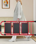Person carrying Lightweight 3 Step Folding Ladder With Non Slip Wide Pedals And Handy Handle Beefy Heavy Duty Steel Build Red Finish