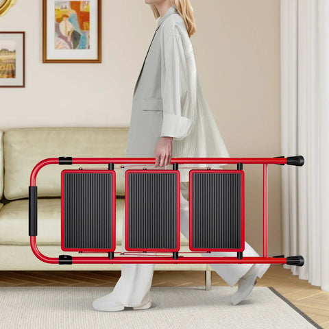 Person carrying Lightweight 3 Step Folding Ladder With Non Slip Wide Pedals And Handy Handle Beefy Heavy Duty Steel Build Red Finish