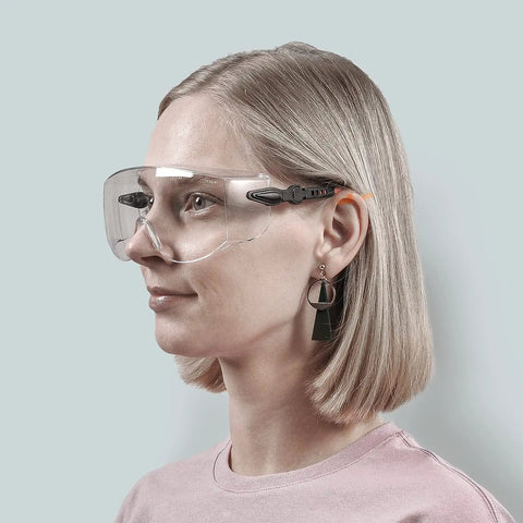 Person wearing Over Eyeglasses Safety Goggles With Anti Fog Lenses And Scratch Resistant HD Clarity ANSI Z87 Approved Protective Eyewear