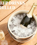 Keep It Frosty 4.8 Liter Insulated Ice Bucket With Snug Fit Lid And Drop Handle Scoop filled with ice and champagne.