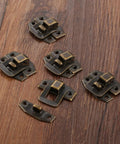 Antique Bronze Box Hasp Lock Set 20Pcs Vintage Jewelry Box Latches 24x19mm on wooden surface, old school retro hardware.