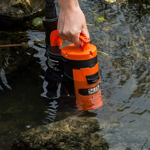 One Half HP Submersible Sump Pump 2110GPH Portable Electric Water Pump With Built-In Float Switch in use for water drainage