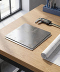 Stainless Steel Square Plate 200x200x2mm Flat Metal Sheet For Cutting With Smooth Mill Finish on a wooden desk