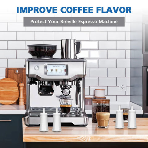 Water filter replacement cartridges for Breville espresso machines, set of four white filters on a kitchen counter.