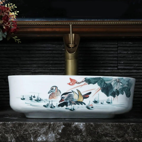 Square Sink Bowls For Bathroom,Ceramic Vessel Sink With Faucet And Drainer Above Counter White Porcelain Ceramic Vessel Vanity Sink With Flower-15 L X 15" W X 5.3" H with floral designs, countertop view.