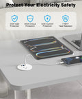 Recessed Power Strip Two Pack Desk Grommet Outlet 2.5 Inch on a desk with laptop and phone charging using USB ports.