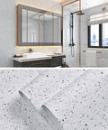 White Glossy Marble Contact Paper Self Adhesive Peel and Stick Wallpaper used in a modern bathroom setting, waterproof and easy to clean.