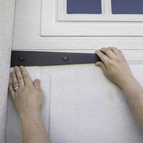 Heavy Duty Magnetic Garage Door Hardware Kit 6 Piece Set installation with steel dampers on white garage door.