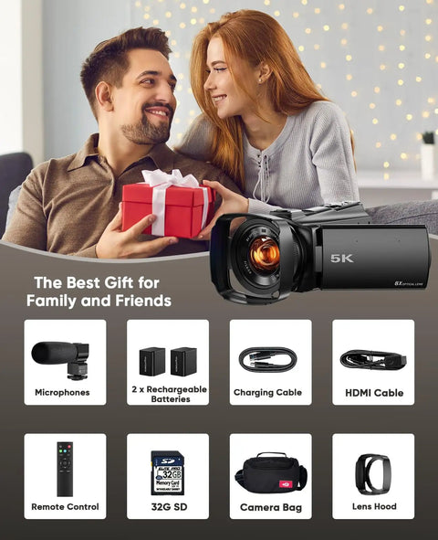 Couple exchanging gift beside Ultra Dope 5K Video Camcorder, accessories shown: microphone, batteries, cables, SD card, bag, lens hood.
