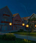 8 Pack Solar Light Stake Replacement Kit With Extension Poles And Joint Connectors lighting up a garden pathway at night