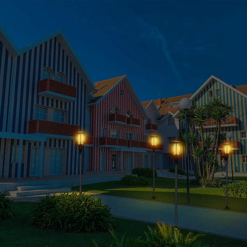 8 Pack Solar Light Stake Replacement Kit With Extension Poles And Joint Connectors lighting up a garden pathway at night