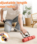 Person using Adjustable Rubber Floor Roller 17.5 To 27 Inch J Roller Heavy Duty Pressure Tool on carpet in living room.